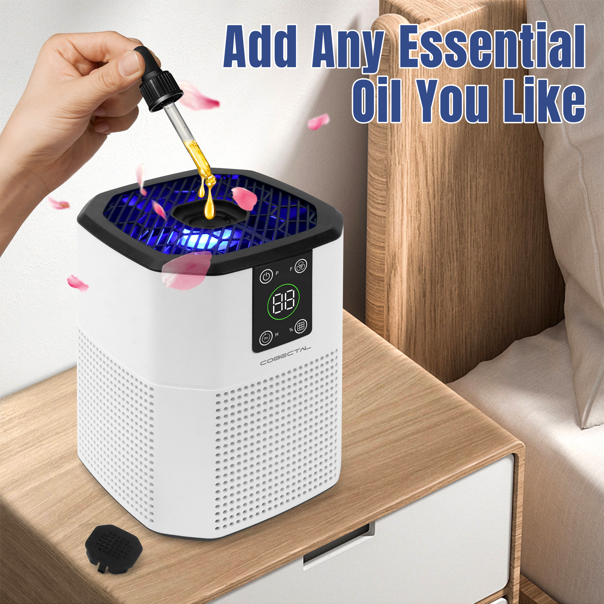 Cobectal ZQ2000C air purifier with aromatherapy function – add your favorite essential oils! Shown with a hand dropping oil into the top, blue light, and petal accents for a fresh, relaxing vibe. Perfect for bedroom use.